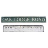 Two 1950's cast aluminium street signs, Oak Lodge Road, 18 x 122cm, Rocher Close, 18 x 107cm.