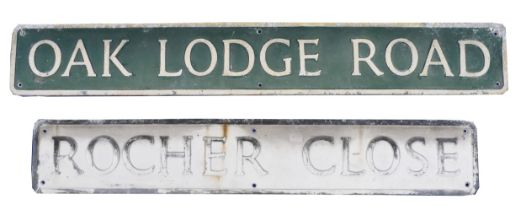 Two 1950's cast aluminium street signs, Oak Lodge Road, 18 x 122cm, Rocher Close, 18 x 107cm.