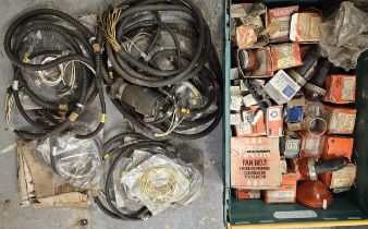 A collection of Land Rover Series/WD wiring looms, lamps and other parts.