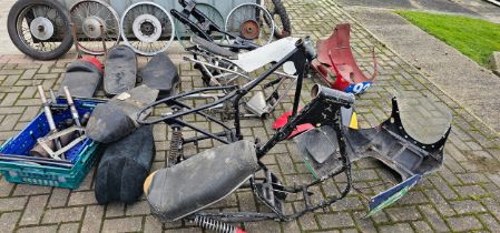 A collection of mainly BSA spares, to include frames, wheels and tinware