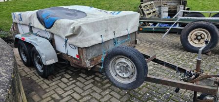 A twin axle works trailer, good wheels/tyres, coil springs and shock absorbers, brakes, built by B &