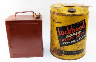 A vintage Lockheed hydraulic fluid drum, 36cm, together with a enamel Firestone sign and a petrol