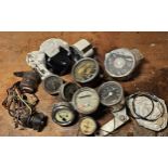 A vintage rear lamps with lens, a Smiths Speedo and other gauges