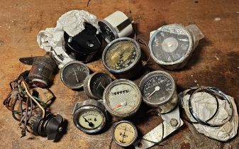 A vintage rear lamps with lens, a Smiths Speedo and other gauges