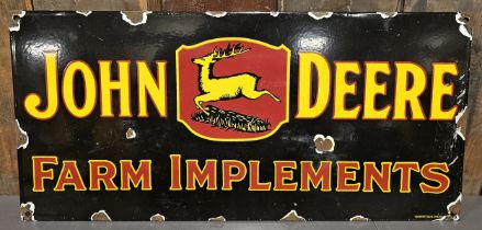 A reproduction John Deere Farm Implements single sided vitreous enamel advertising sign, 45 x 21cm