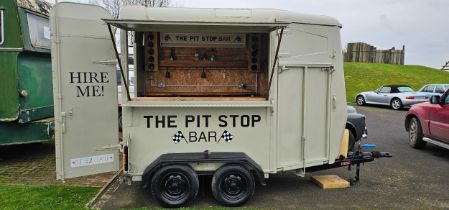 A mobile catering unit/bar, converted from a twin axle horse box, fitted electrical system and water