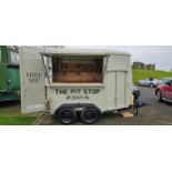 A mobile catering unit/bar, converted from a twin axle horse box, fitted electrical system and water