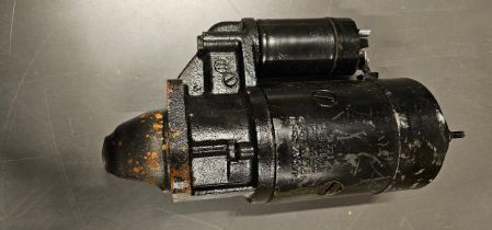 A Bosch 221 12 volt starter motor, serial number 0001211016, NOS