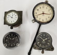 A Smiths 8 day 2 1/4" black dial car clock, a Smiths M.A. L.L.H. x 69983/3 car clock, a Jaeger car