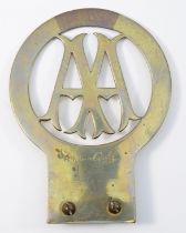 An early brass AA car badge, stenson Cooke signature, c.1906, not numbered, copper insert to the top