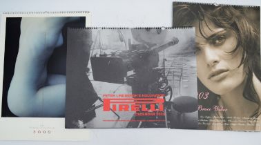 A quantity of Pirelli Calendars in original cardboard packaging, opened. To include: ~ A Pirelli