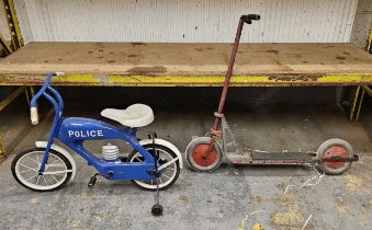 A vintage child's metal tricycle in the form of a motorcycle and a scooter (2)