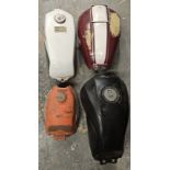 Three Honda petrol tanks and another tank