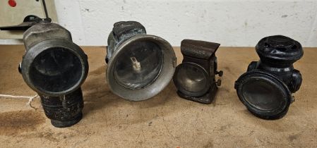 Four vintage bicycle lamps, P&H, Miller and two by Lucas