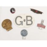 A Morris Eight badge, a Rover Sports Register alloy and enamel badge, a Vintage Riley Register
