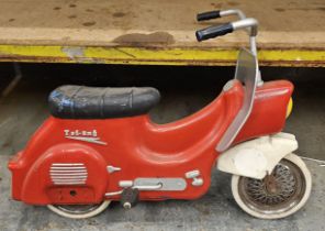 A vintage Triang plastic pedal bicycle, in the form of a 1950/60's motorcycle.