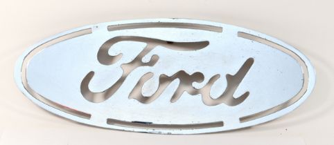 Ford, a chrome cut out oval sign, with three bolt attachment,, 43 x 17cm