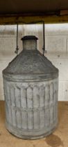 A Regent Oil Co. galvanised five gallon pyramid can, cap, 56cm with hand raised.