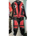 A Frank Thomas set of red/black leathers, size 46