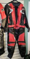 A Frank Thomas set of red/black leathers, size 46