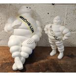 A Bibendum or Michelin Man plastic seated lamp, lacking lighting, 50cm and a standing example,