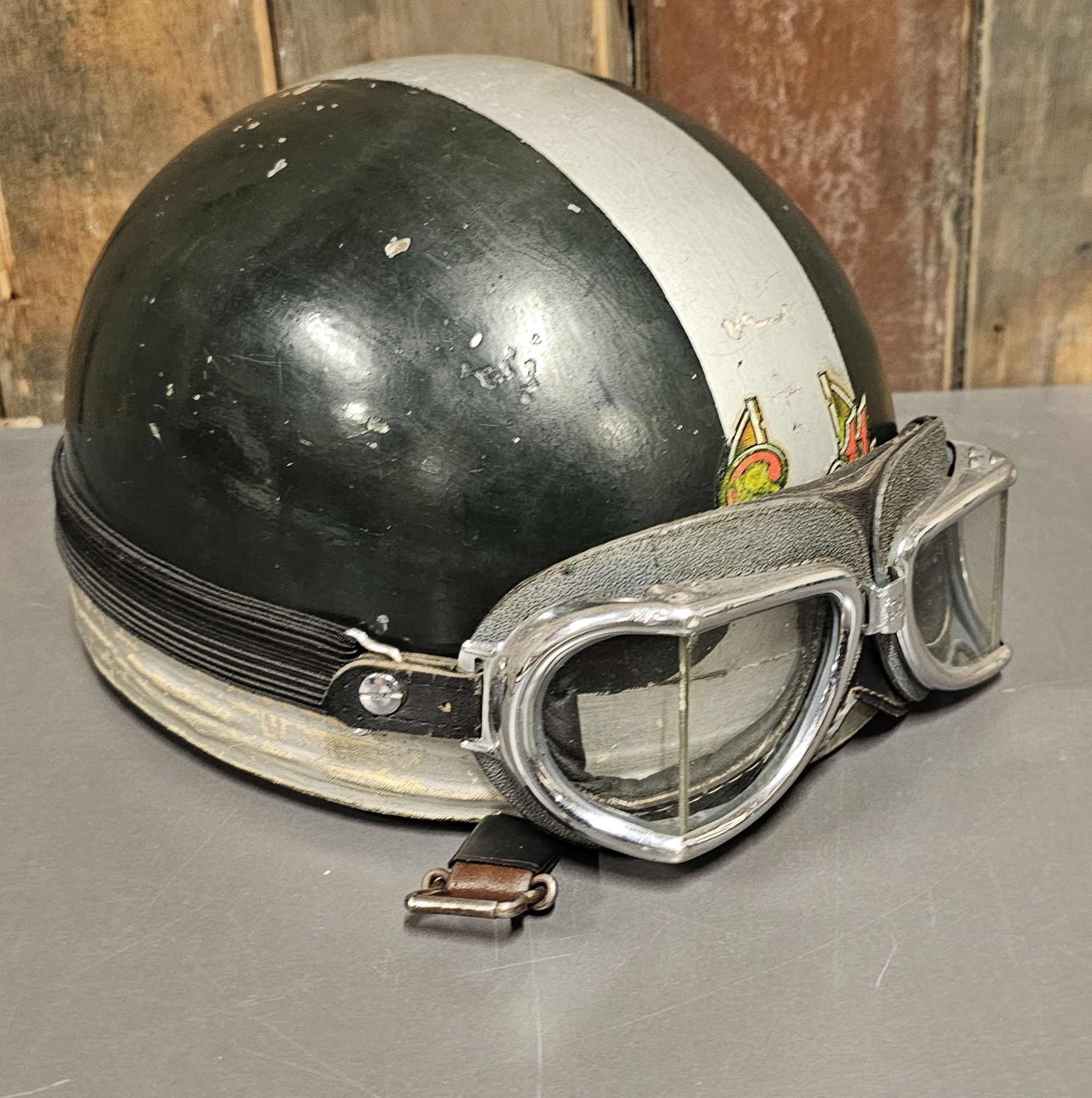 A vintage Everoak cork helmet, with Scott emblem, size 7,together with a pair of Climax O Espana