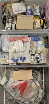 Two boxes of assorted motorcycle accessories and 22 assorted cables NOS (3)