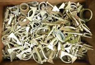 A collection of NOS exhaust clamps