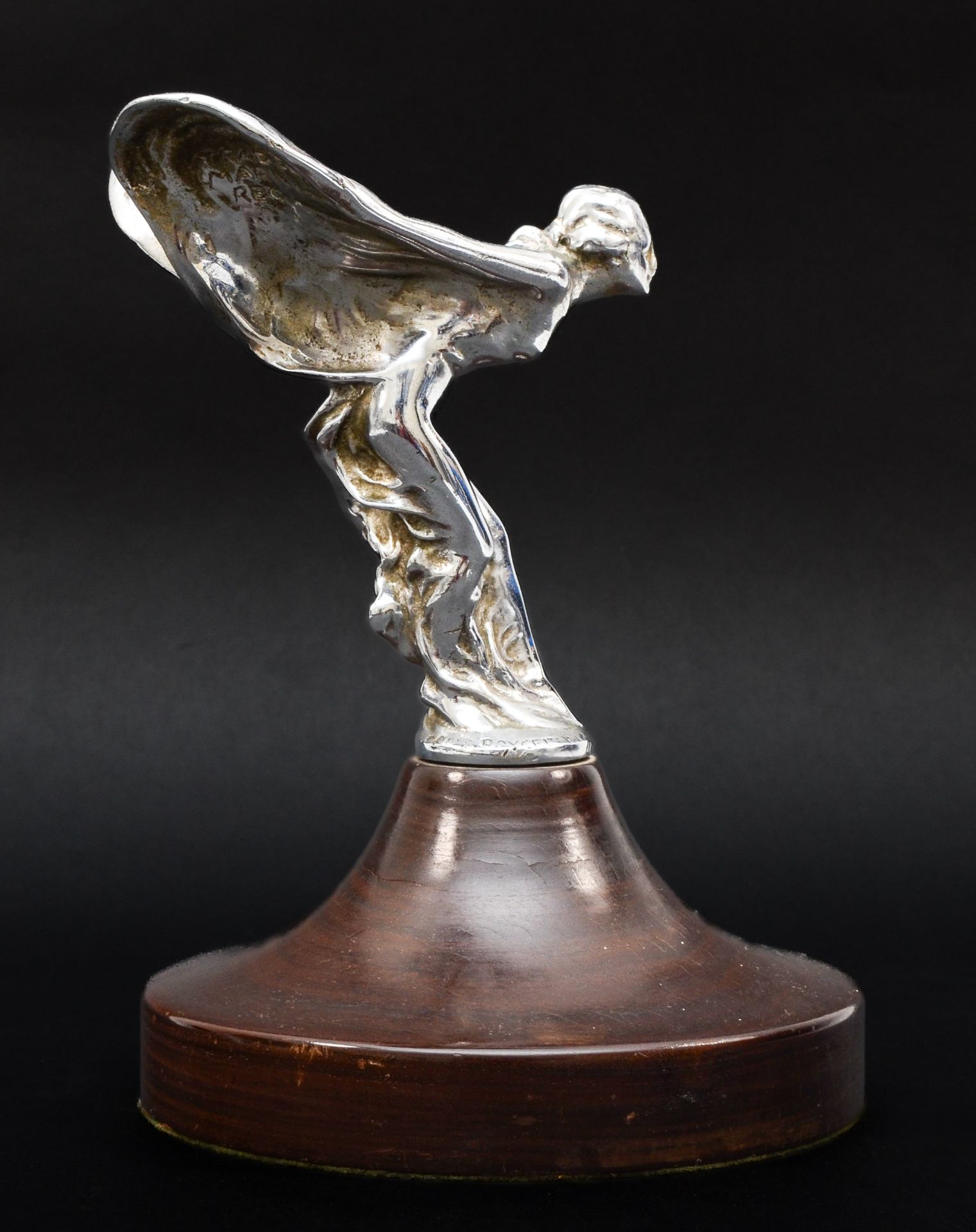 A Rolls Royce Spirit of Ecstasy mascot, probably Phantom I or II, signed Charles Sykes to the left