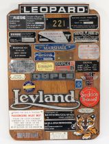 A collection of vintage bus related badges