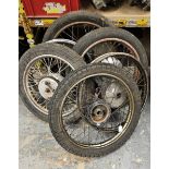 A Triumph Tiger Cub front wheel and 5 other Triumph wheels