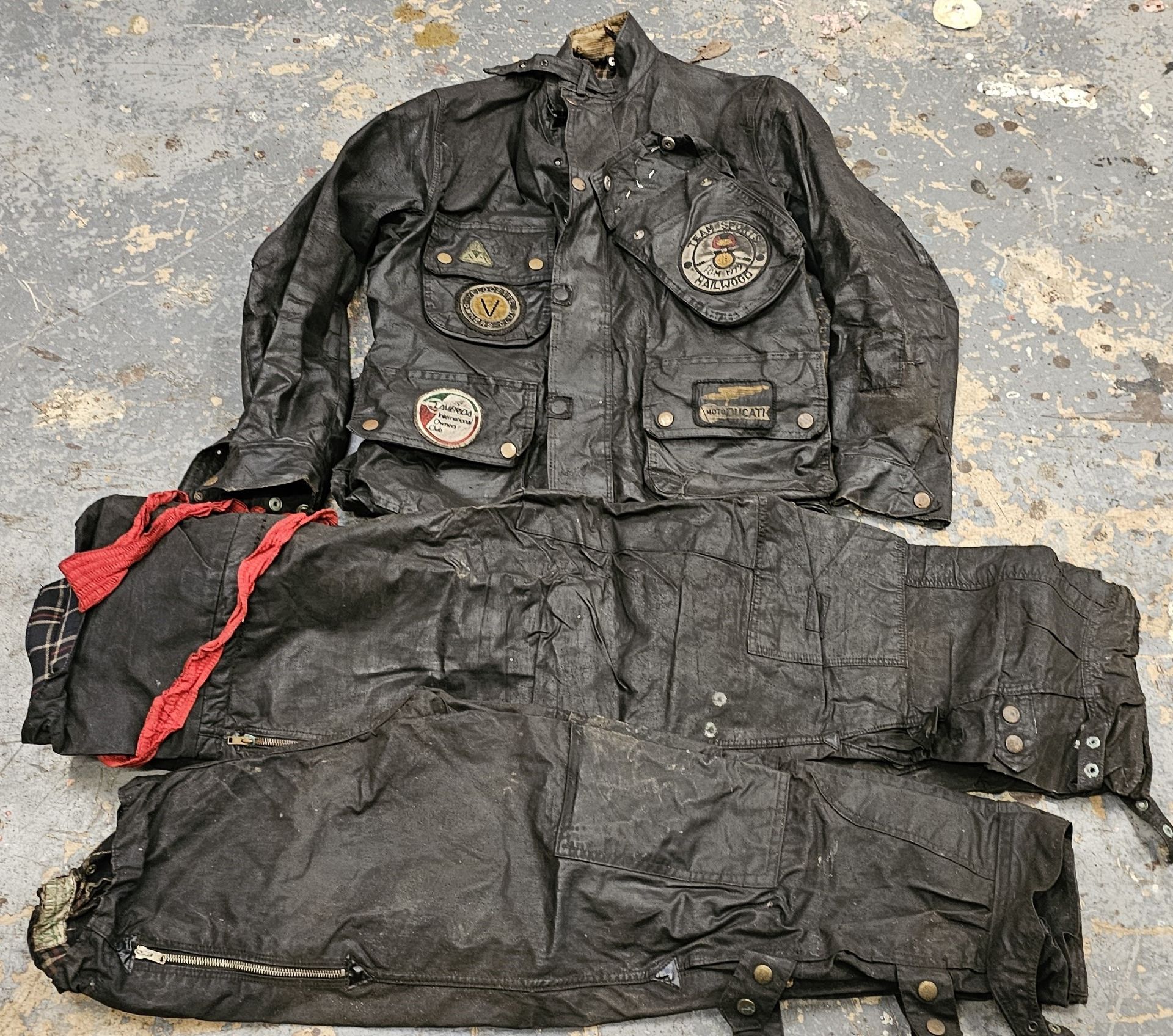A Barbour wax jacket, size L, an unbranded pair of trousers and a ladies pair of Barbour wax