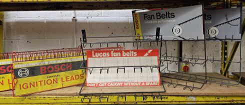 Two Bosch ignition lead wall display units, two Bosch fan belt wall display units and a Lucas fan