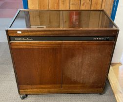 Phillips; a late 20th century electric hostess trolley, raised on wheels, 75cm wide