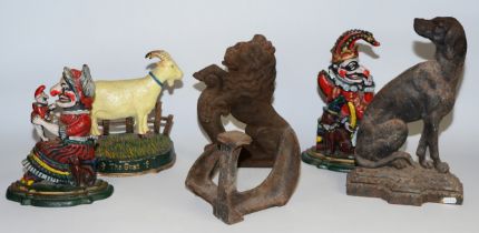 A pair of 20th century painted cast iron door stops in the form of Punch and Judy, 31cm high