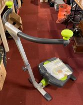 An Exer 'Twist and Shape' fitness machine, complete with instructions, as new condition.