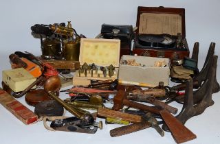 A collection of early 20th century and later hand tools to include a cased Weston volt meter,