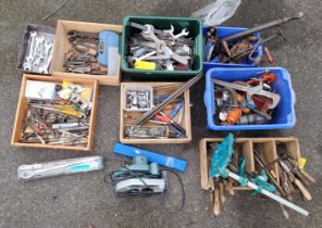 A shelf of used tools to include chisels, spanners, wrench, and a Black and Decker pro line 62mm