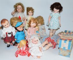 A group of mid and later 20th century dolls to include two boxed Pedigree dolls, two spare boxes and