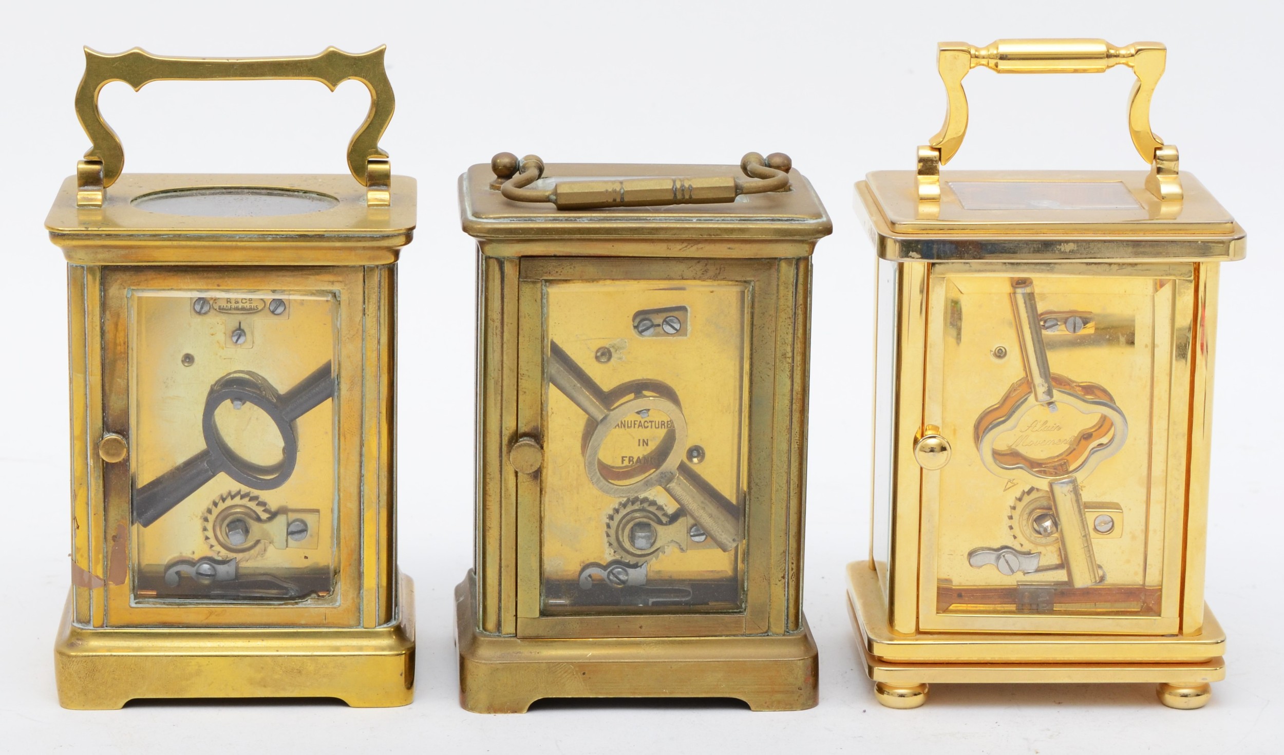 Churchill; a contemporary brass cased carriage clock, the white dial with black Roman numerals and - Image 3 of 5