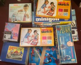A collection of 1960s/70s board games and toys, to include KerPlunk, Etcha.a.sketch, racing car sets