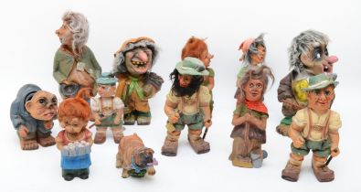 Twelve mid 20th century bobble headed celluloid dolls and mythical creatures