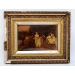 A late 19th early 20th century gilt framed crystoleum, with figures in a country garden, 18 x 26.