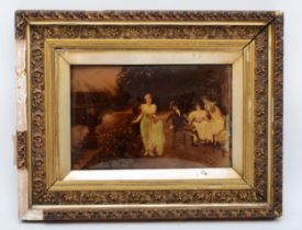 A late 19th early 20th century gilt framed crystoleum, with figures in a country garden, 18 x 26.