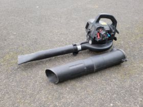 A McCullock BVM 240 petrol leaf blower and accessories.