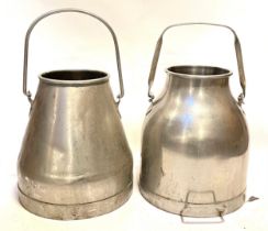 A matched pair of polished aluminium conical shaped milk pails, each with a swing handle, 78cm high.