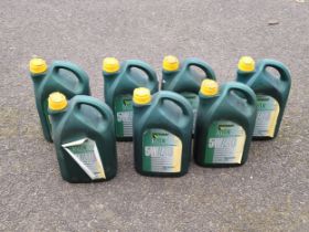 Seven 5 litre Motaquip MQX 5W/40 bottles of engine oil.