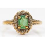 A 9ct gold emerald and eight cut diamond dress ring, L, 1.6gm.