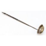 A Georgian silver toddy ladle, unmarked, coin bottom bowl and whale bone handle, 30cm.