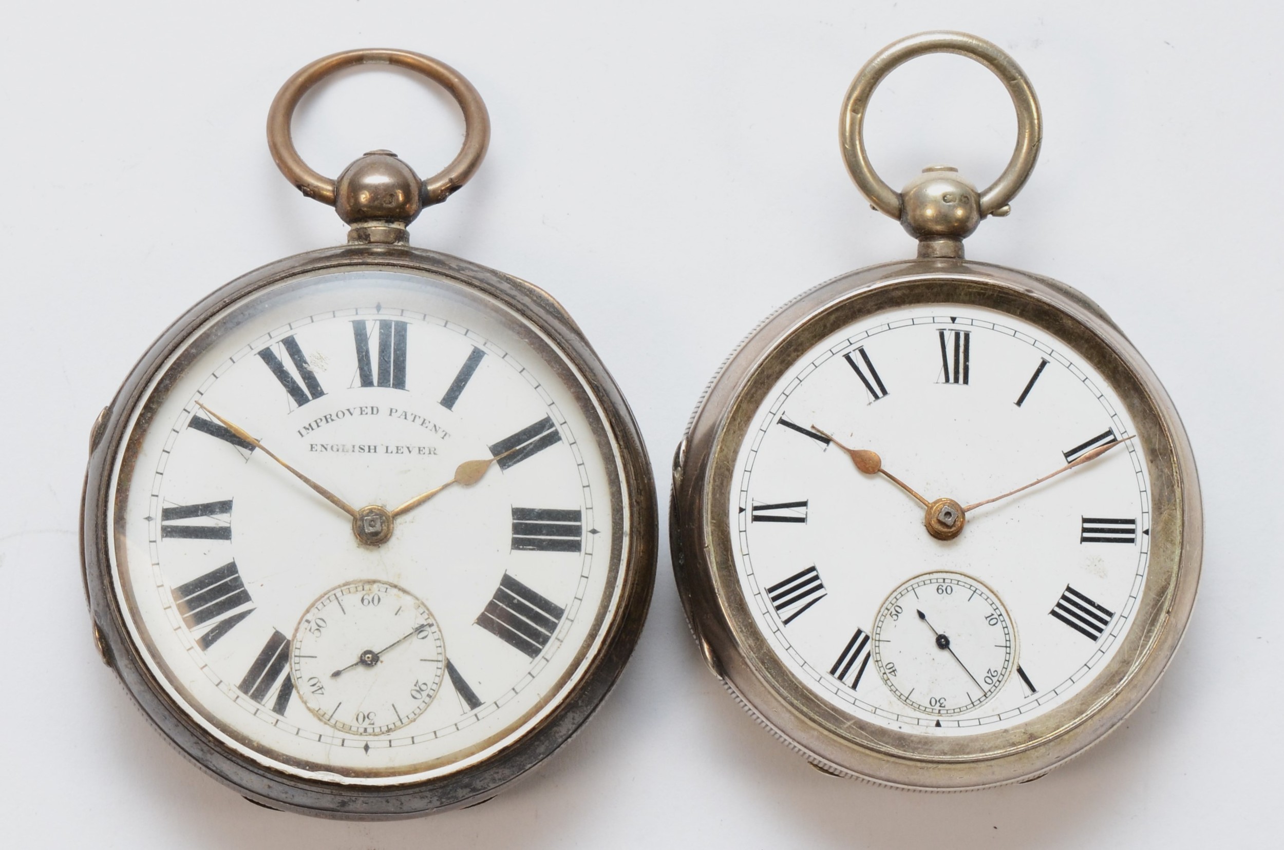 Two silver cased open faced key wind pocket watch, unsigned movements, numbers 198366, 491019, (2).